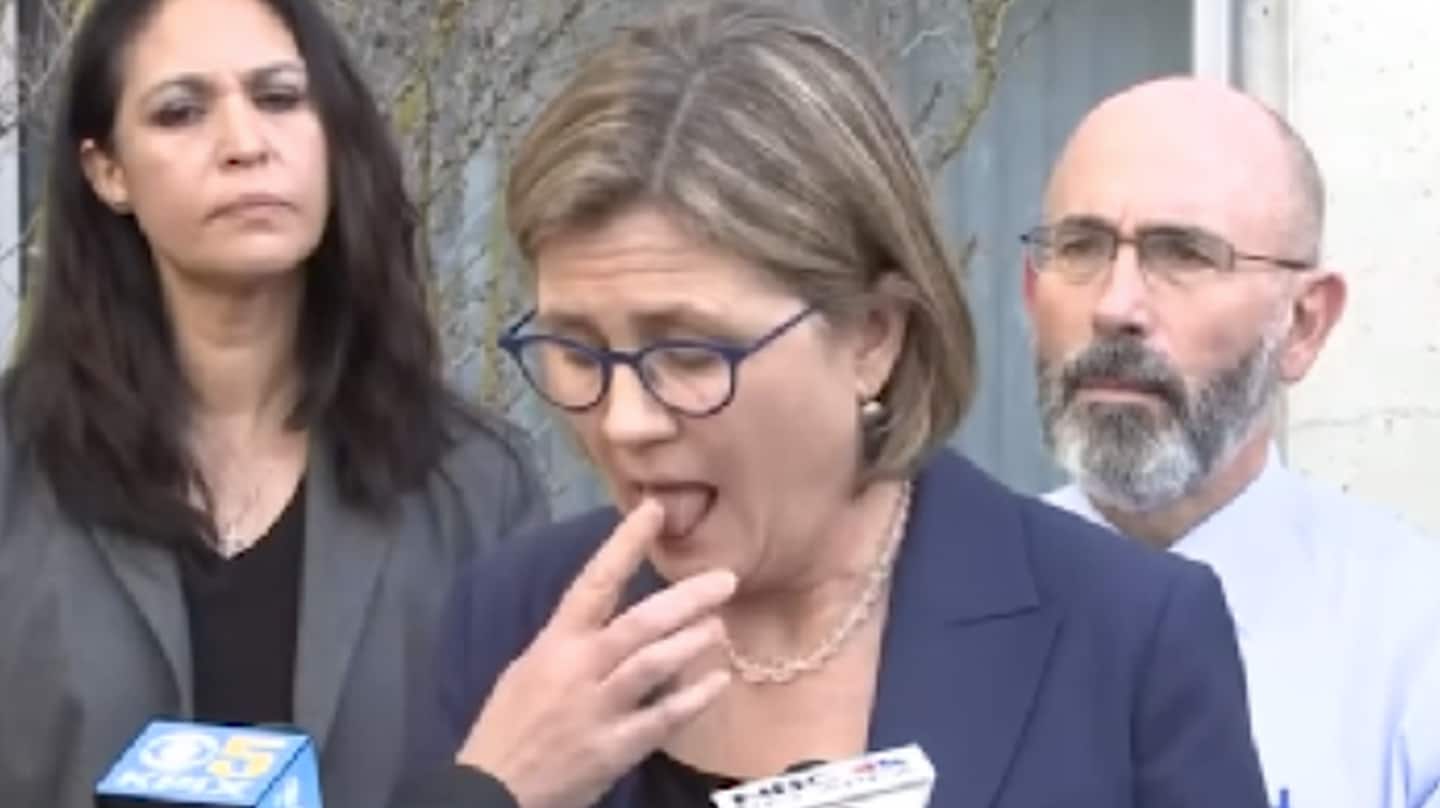 This health official was licking her
                        fingers to turn pages